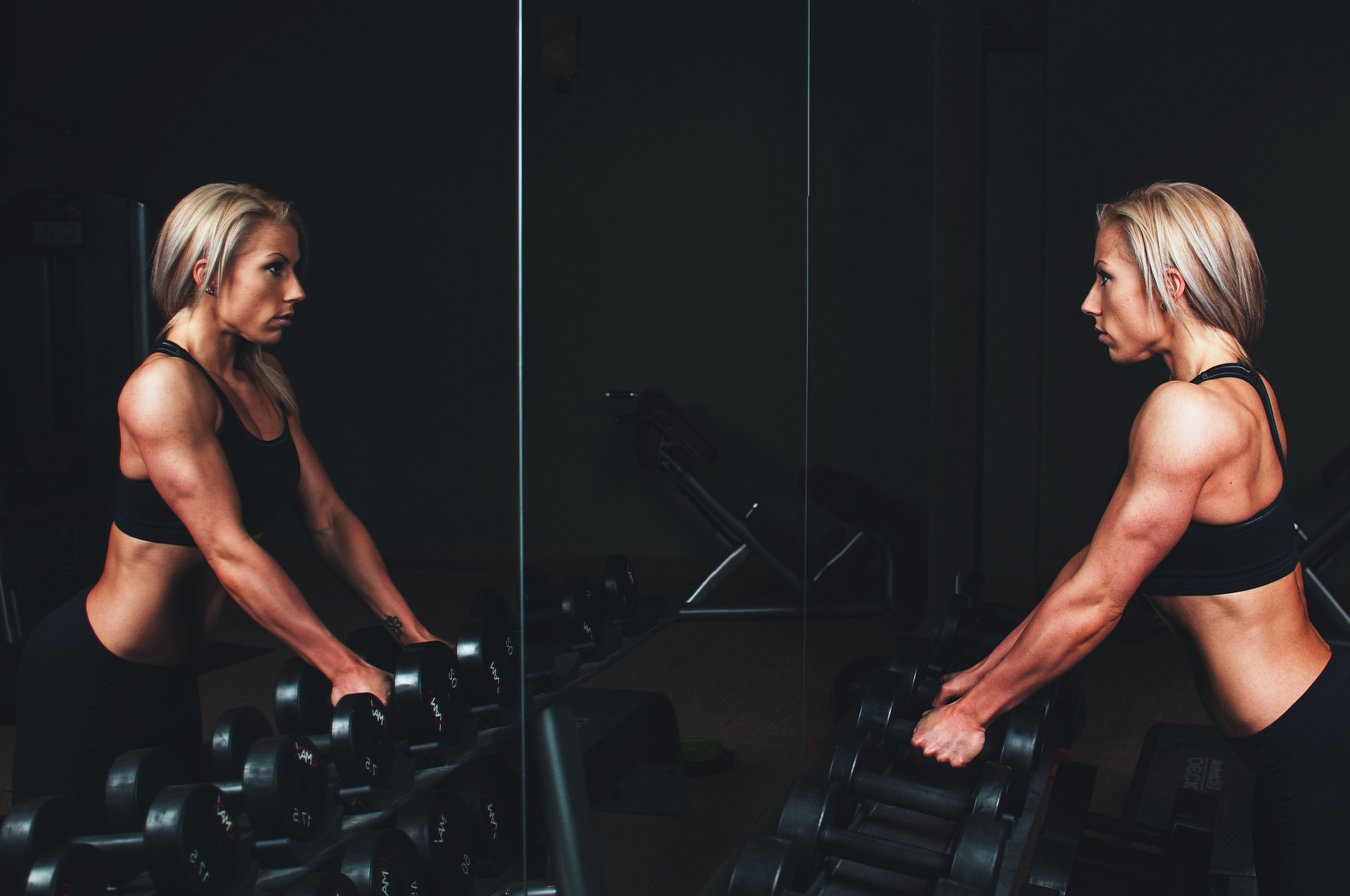 A woman training with dumbells